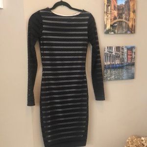 Reid’s size 2 black lace cocktail dress.